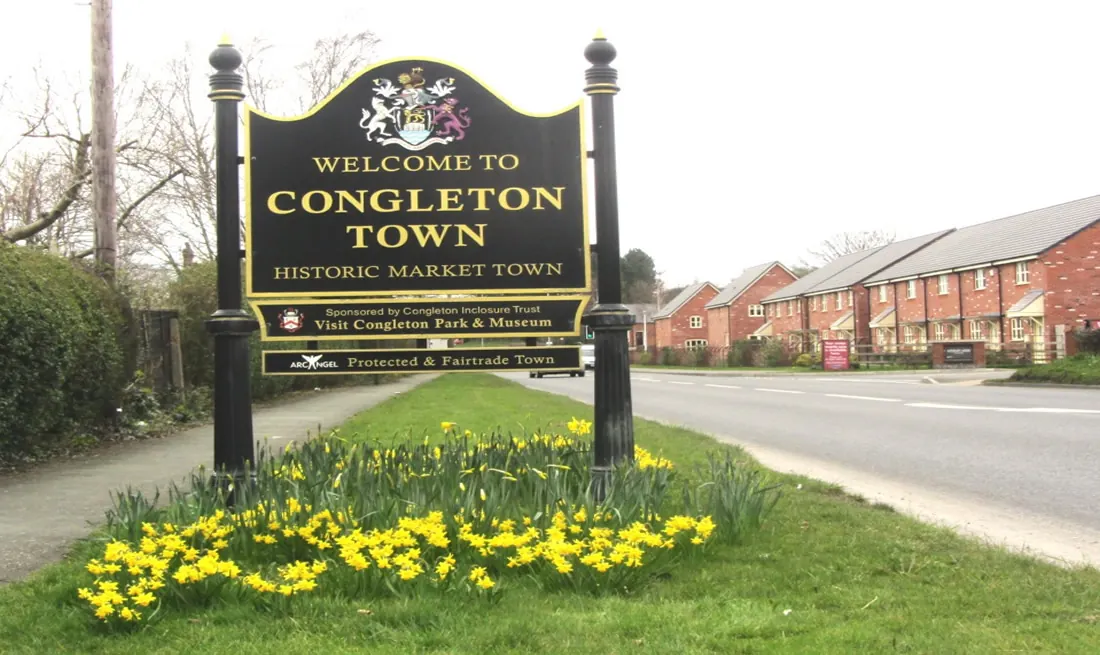 Welcome to Congleton town sign beside a residential street