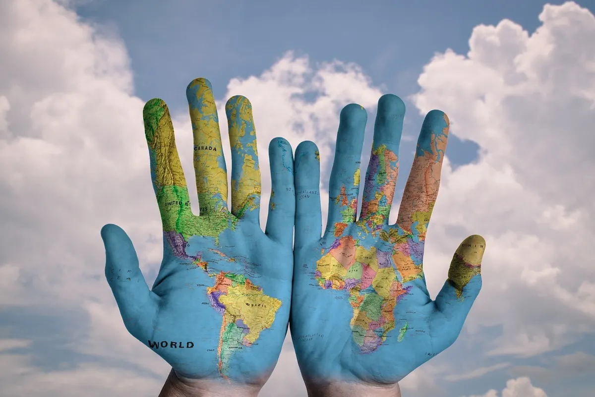 Everything you need to know about International Moving Insurance Map of World on Hands
