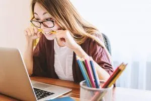 A person getting stressed while planning a last-minute relocation. Getting stressed