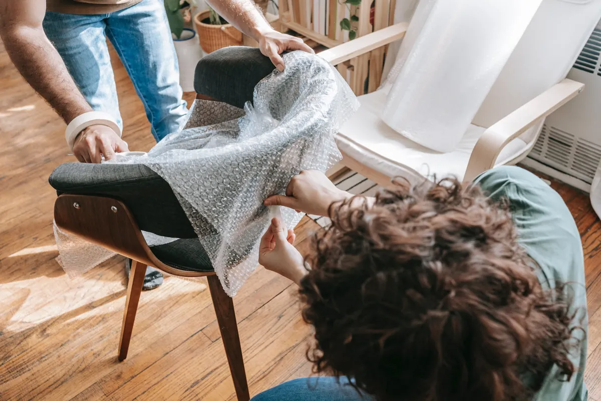 Protecting expensive furniture items with bubble wrap
