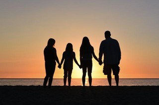 a family on a beach