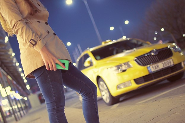 Woman waiting for a taxi